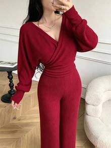 Celisse Autumn Atmosphere Burgundy Knit Jumpsuit With Criss-Cross V-Neck, Cinched Waist, Ribbed Flare Legs, Suitable For Holiday Parties, Dates, Commuting Outfits - Red - View 1