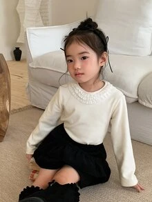 DAZY Áo bé gái màu trơn cổ tròn phối ren thời trang đa năng - Màu be - Xem 5