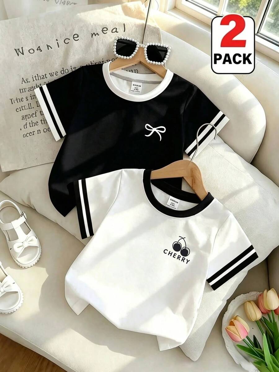 SHEIN 2件組聖誕萬聖節秋季休閒時尚女童T恤套裝,簡約蝴蝶結與櫻桃印花短袖上衣,美式復古圖案兩件式穿搭,適合4Y-7Y小女孩外出穿著,四季皆宜,白色與黑色配色上衣 - 白色 - 查看 1