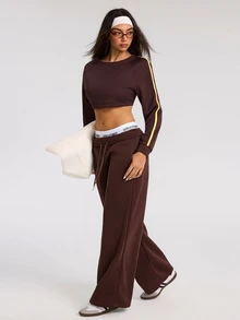 Dewbera Dewbera بلوزة رياضية نسائية بياقة دائرية وأكمام طويلة بألوان صفراء وبنية بتصميم كتل لونية قصيرة ومحكمة - بني - مشاهدة 3