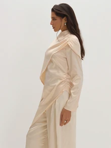 MUSEYN Blus Lengan Panjang Asimetris Bergaya Cape Satin Krem, Elegan untuk Kencan Malam, Chic, dan Musim Gugur. - Putih - View 4