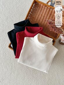 女童高領針織內搭上衣，高領設計能有效保護女孩頸部免受冷風侵襲，為整體造型增添優雅感。簡約經典設計，適合多種層次穿搭與外套組合，完美適配日常休閒、戶外出遊、戶外活動及秋冬季節 - 彩色 - 查看 5