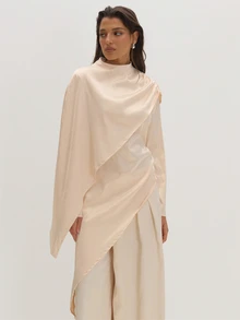 MUSEYN Blus Lengan Panjang Asimetris Bergaya Cape Satin Krem, Elegan untuk Kencan Malam, Chic, dan Musim Gugur. - Putih - View 1