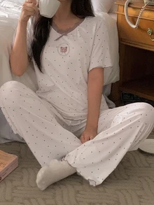DAZY Bộ đồ ngủ nữ 2 món áo cổ tròn tay ngắn họa tiết chấm bi đính nơ và quần - trắng - Xem 13
