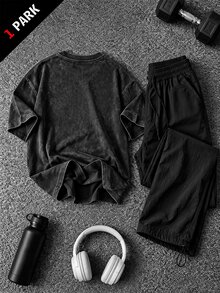 Gym Rark طقم رياضي رجالي بلون موحد، ملابس علوية بأكمام قصيرة وطبعة كرتونية وياقة دائرية، وبنطال فضفاض بقصة واسعة وكاجوال - الأسود - مشاهدة 2
