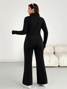 Shapeblank طقم كاجوال من قطعتين للنساء بمقاس كبير، ملابس علوية بأكمام طويلة وسحاب أمامي وبنطال واسع بلون موحد - الأسود - مشاهدة 3