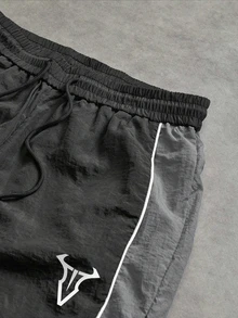 Sport MetroGents Celana Panjang Olahraga Pria Model Longgar dengan Motif Kepala Banteng dan Tali Serut di Pinggang - MultiWarna - View 3