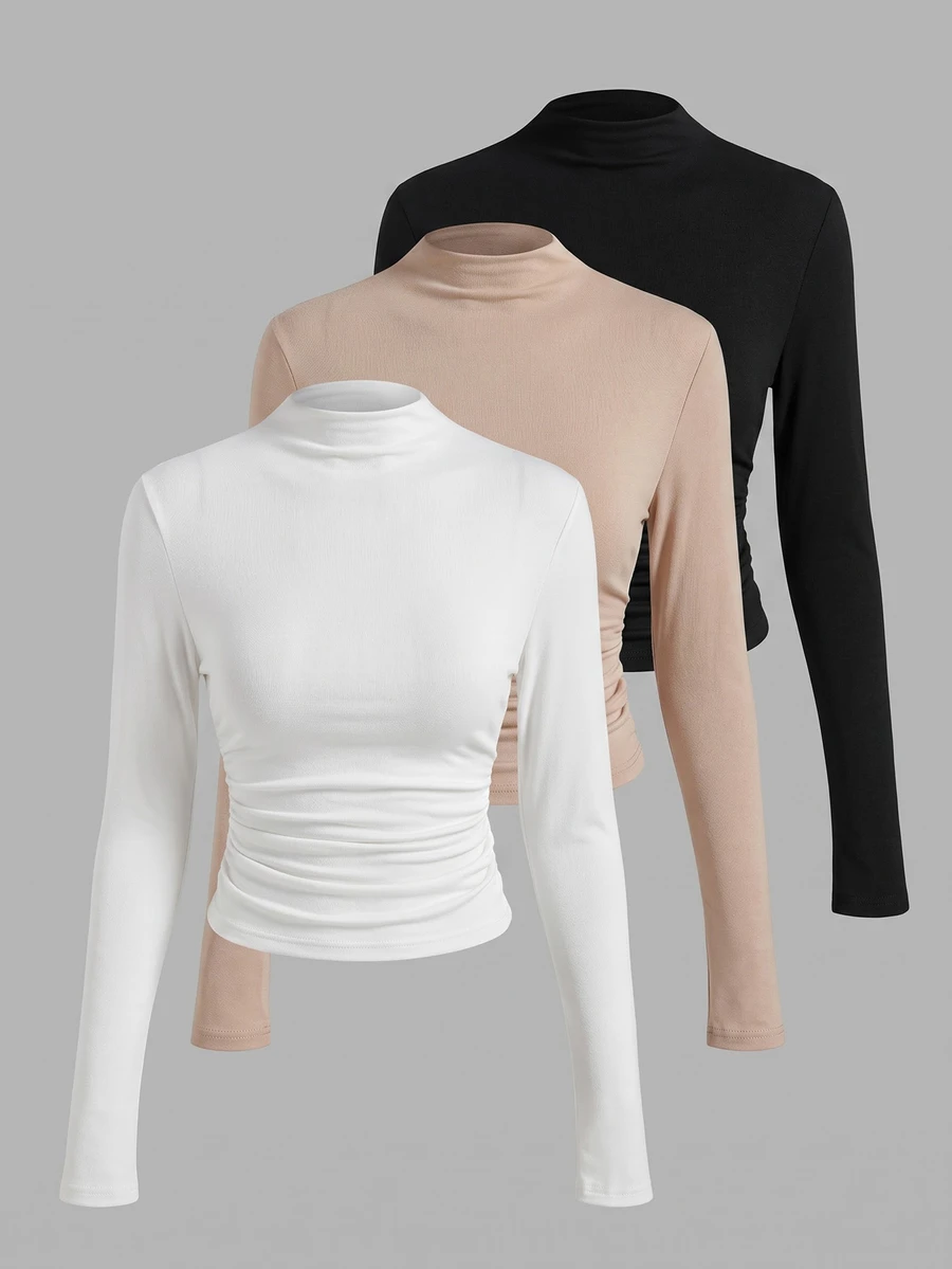 Everyssa Atasan lengan panjang model slim fit dengan kerah tinggi, tersedia dalam warna putih, khaki, dan hitam. Kain lembut, cocok untuk dipadukan dengan pakaian lain. - MultiWarna - View 1