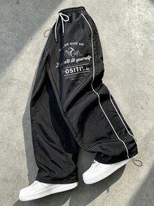 RISE LYT 男士運動長褲抽繩設計，字母印花圖案，都市復古街頭風，休閒時尚創意個性街頭穿搭 - 黑色 - 查看 1