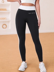 Eassivo Women's High Waist Athletic Leggings - Black and White - View 6
