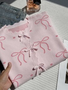 SHEIN 女童秋冬時尚百搭短版粉色提花蝴蝶結＋手工蝴蝶結開襟衫，蝴蝶與鈕扣細節增添甜美優雅感，柔軟面料易搭配長褲與裙裝，適合派對、外出、購物、上學等多種場合的秋冬時尚單品 - 粉色 - 查看 7