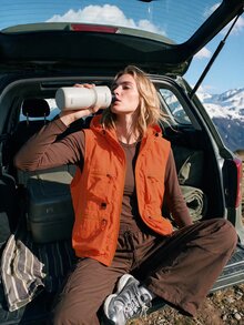 WanderVale Women's Solid Color Large Pocket Zipper Front Sleeveless Outdoor Sports Vest - Orange - View 5