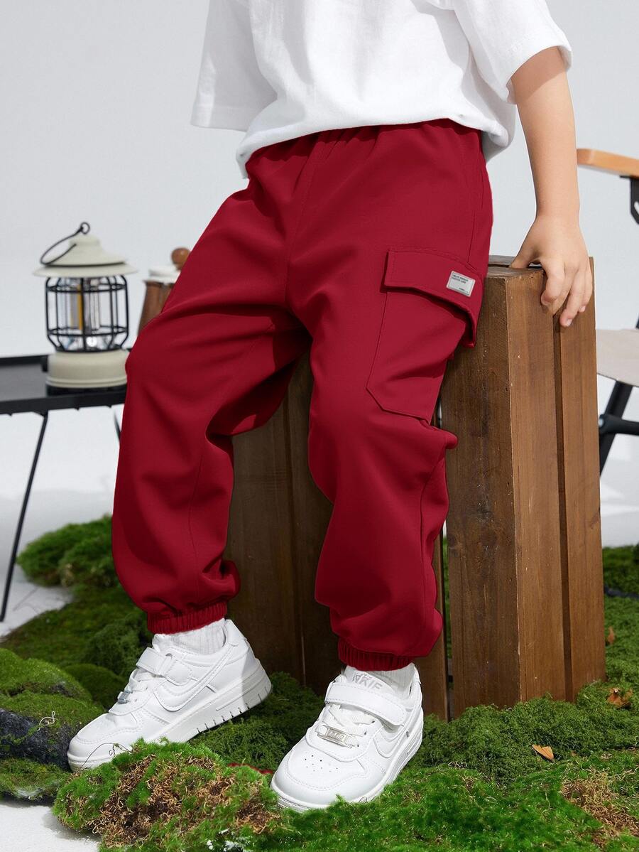 SHEIN Kids Young Boy Casual Sports Printed Pattern Patch Pocket Loose Tapered Solid Color Cargo Pants Suitable For Commuting School Daily Casual Vacation Travel Suitable For Sports Suitable For Spring Summer Autumn Winter - Red - View 1