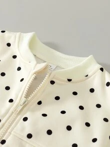SHEIN 女童波點兩件套，奶油白拉鍊長袖外套，滿版黑色波點，羅紋袖口與下擺；搭配波點長褲。適合日常上學、開學季、派對活動、戶外拍照、拜訪親友、郊區出遊，春秋穿著 - 杏色 - 查看 5