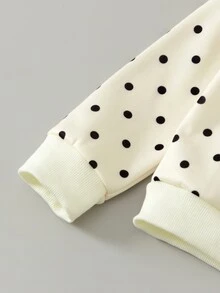 SHEIN 女童波點兩件套，奶油白拉鍊長袖外套，滿版黑色波點，羅紋袖口與下擺；搭配波點長褲。適合日常上學、開學季、派對活動、戶外拍照、拜訪親友、郊區出遊，春秋穿著 - 杏色 - 查看 4