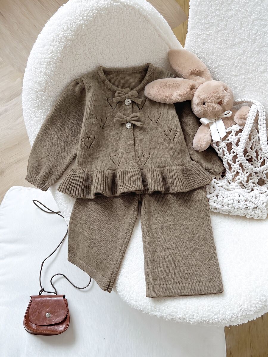 SHEIN Gentle Style Baby Girl Hollow Heart Jacquard Knit Set, Bow Knot Button Cardigan, Frill Trim Sweater, Flare Pants, 2 Pieces Set - Camel - View 1
