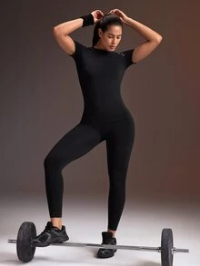Powerista طقم رياضي نسائي بدون درزات بقصة ضيقة، توب بأكمام قصيرة + بنطال ليقنز ضيق بطول الكاحل - الأسود - مشاهدة 4