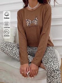 SHEIN طقم نسائي قطن لاين بلس من قطعتين: توب برقبة دائرية وأكمام طويلة بطبعة نمر وفيونكة، وبنطلون مريح بخصر عالي - متعدد الألوان - مشاهدة 9