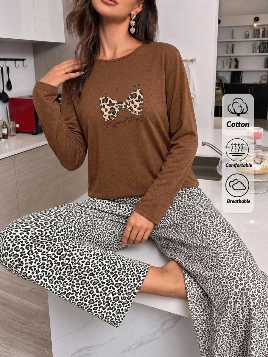 SHEIN طقم نسائي قطن لاين بلس من قطعتين: توب برقبة دائرية وأكمام طويلة بطبعة نمر وفيونكة، وبنطلون مريح بخصر عالي - متعدد الألوان - مشاهدة 1