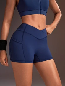 Powerista Women's Minimalist Solid Color V-Waist High-Waisted Side Pocket Athletic Shorts - Navy Blue - View 4