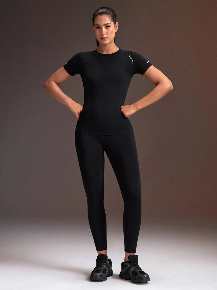 Powerista Women's Seamless Slim Fit Short Sleeve Top + Tight Ankle-Length Leggings Sports Set(Suitable For Jogging And Workout) - Black - View 1