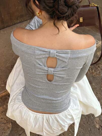 Cévolie Damen Off-Shoulder Rückenfrei Schleifen Design Slim Fit Langarm T-Shirt, Französisch Elegant Süß Mode Minimalistisch Langarm Top, Geeignet für den täglichen Gebrauch, Spaziergänge und andere Anlässe