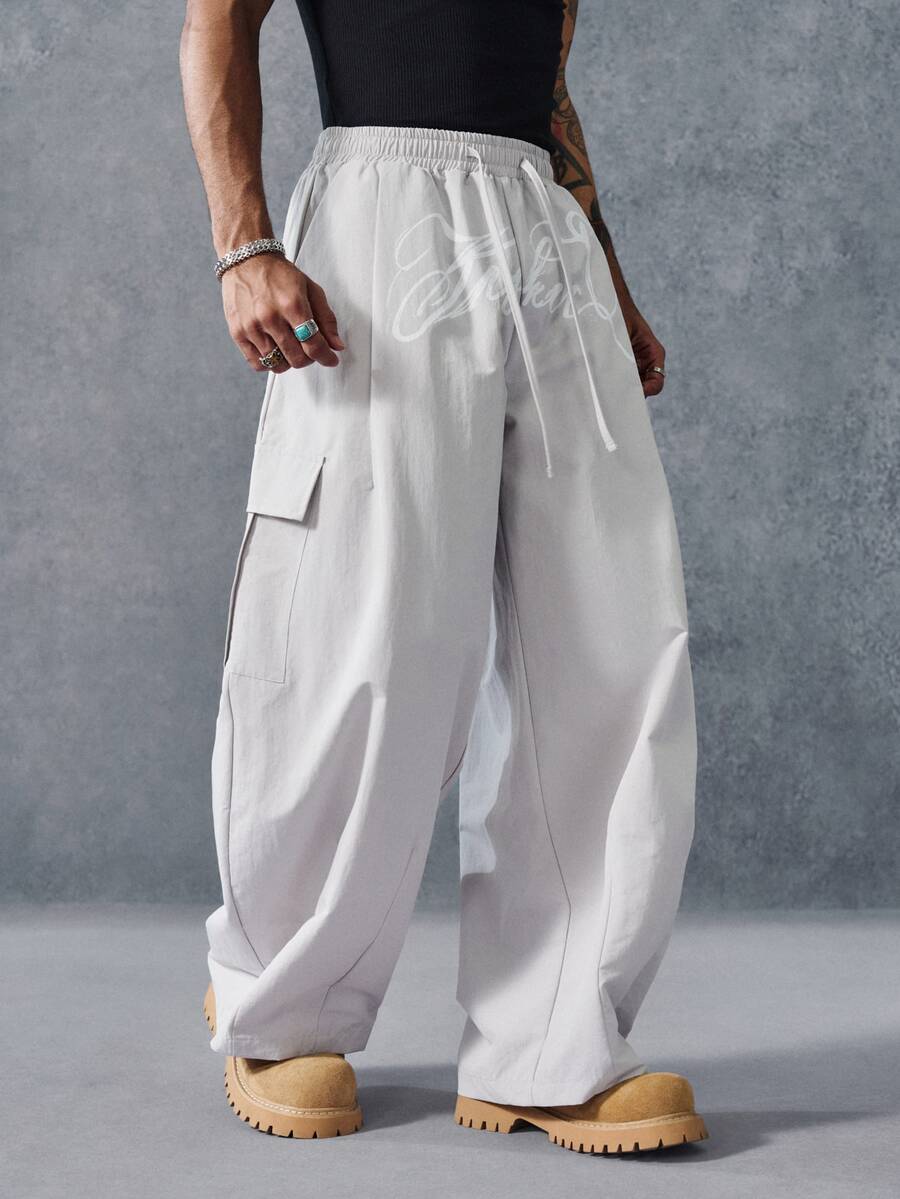 PAVTROS Men's Letter Print Drawstring Waist Wide Leg Loose Cargo Pants - Light Grey - View 1