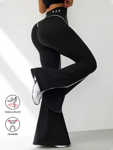 Slayform 1件女款無縫拼色交叉腰休閒工作室訓練瑜伽長款喇叭褲，開衩褲腳 - 黑與白 - 查看 1
