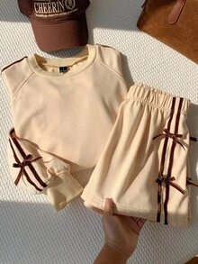 Comfortcana Women's Bowknot Decor Raglan Long Sleeve Sweatshirt And Shorts Casual 2 Pieces Set - Apricot - View 1