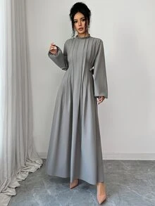 Yasmyna Gaun Arab Wanita Warna Polos dengan Hiasan Rumbai, Kerah Tegak, dan Desain Lipit - Grey - View 1