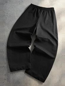 ROMWE MEN بنطال رجالي بأسلوب الشارع الأمريكي بساق واسعة منحنية، طباعة زهور غريبة داكنة مع عيون، علامة تجارية متخصصة، قصة فضفاضة بأسلوب الهيب هوب - الأسود - مشاهدة 2