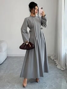 Yasmyna Gaun Arab Wanita Warna Polos dengan Hiasan Rumbai, Kerah Tegak, dan Desain Lipit - Grey - View 5