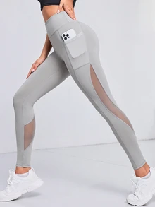 Exploreva Exploreva Women's Solid Color Contrast Mesh Pocket Sports Leggings - Light Grey - View 1