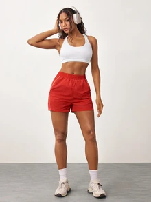 Core Rhythm Core Rhythm شورت رياضي نسائي أحمر عصري متعدد الاستخدامات للتنقل اليومي والتمارين واللياقة البدنية - الأحمر - مشاهدة 5
