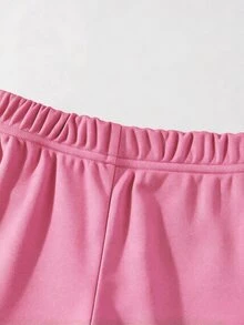 SHEIN 2件組女童甜酷風3D蝴蝶結裝飾白色上衣+黑色喇叭褲套裝，黑色上衣飾有多個粉色蝴蝶結，洋紅色喇叭褲時尚剪裁，整體風格偏向甜酷融合可愛與時尚，適合返校、外出、街頭穿搭 - 彩色 - 查看 4