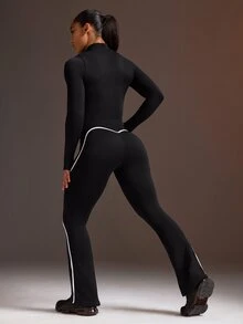 Powerista Women's Half-Zip Long Sleeve Sports Jumpsuit - Black - View 1