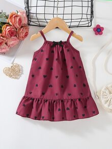SHEIN Vintaside Kids 女童復古波點細肩帶洋裝，經典酒紅愛心配甜美酷感蝴蝶結，法式女孩風，荷葉邊下擺輕盈飄逸，寬鬆舒適清爽 - 酒紅色 - 查看 1