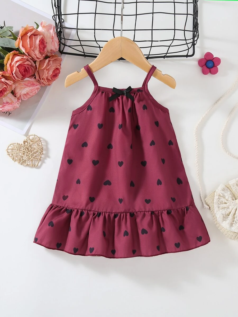 SHEIN Vintaside Kids 女童復古波點細肩帶洋裝,經典酒紅愛心配甜美酷感蝴蝶結,法式女孩風,荷葉邊下擺輕盈飄逸,寬鬆舒適清爽 - 酒紅色 - 查看 1