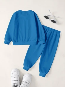 LOONEY TUNES X SHEIN طقم كاجوال للأولاد الصغار يتكون من سويت شيرت بأكمام طويلة وبنطلون رياضي بطبعة كرتونية وحروف - أبيض - مشاهدة 2