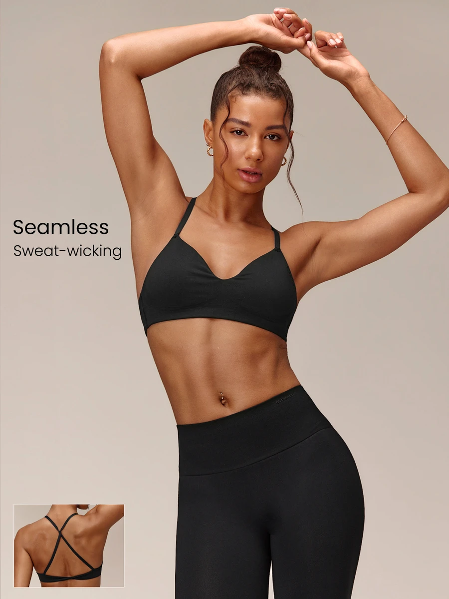 GLOWMODE Seamless Twist Of Summer Sports Bra With Twist Cross-Back Design & Removable Cups Low Impact Yoga Pilates Barre Lagree Studio Active Wear - Black - View 1