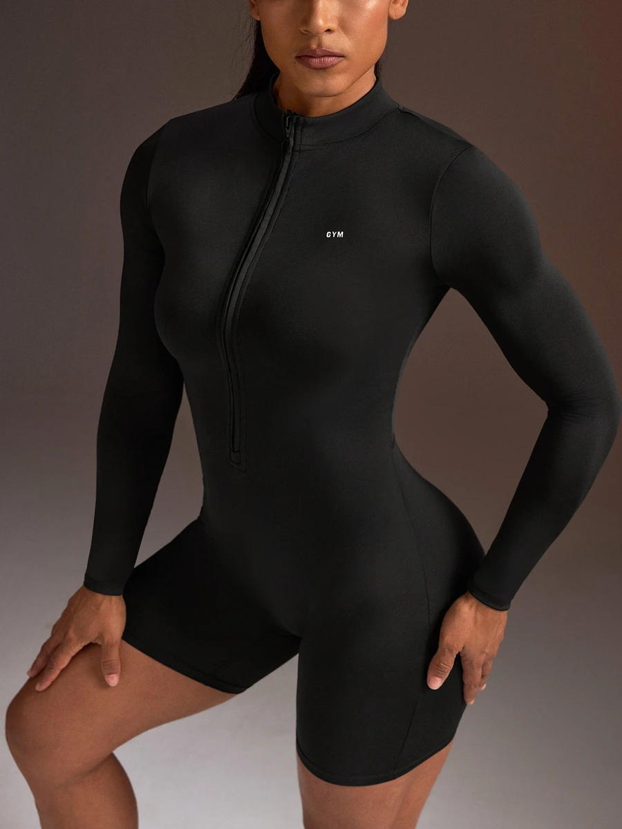 Powerista Women's Half-Zip Long Sleeve Athletic Romper - Black - View 1