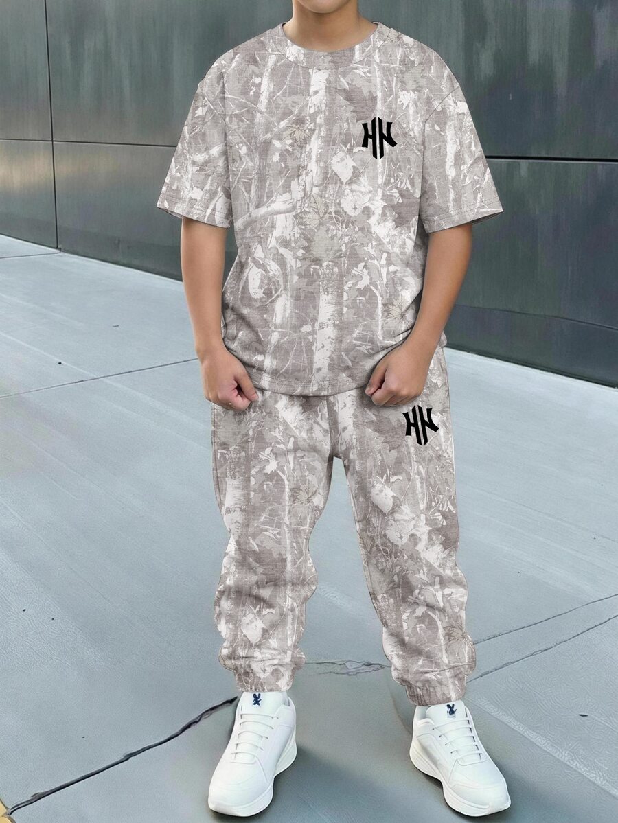 青少年男孩休閒簡約短袖圓領T恤與長褲套裝,適合夏季,附卡通圖案 - 彩色 - 查看 1