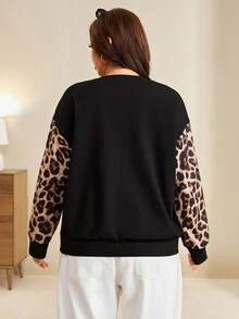 Edennvi Plus Size Women's New Fashion Autumn/Winter Minimalist Crew Neck Textured Fabric Sleeve Patchwork Leopard Print Casual Sweatshirt - Black - View 2