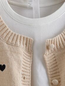 GlowEve CURVE Cardigan Rajut Leher Bulat Bordir Hati Hitam di Seluruh Permukaan Warna Aprikot Muda untuk Wanita Ukuran Plus, Longgar, Bahu Jatuh, Lengan Panjang, Kancing Tunggal, Lembut, Ramah Kulit, Hem Bergaris, Melangsingkan, Menyanjung, Serbaguna untuk Musim Semi dan Gugur, Jaket Sweater untuk Perjalanan Sehari-hari - Khaki - View 4