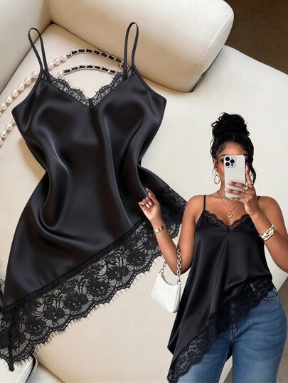 Ceyna Camisola asimétrica de satén negro para mujer talla grande, diseño de cuello en V con ribete de encaje de pestañas, tela suave y fluida, dobladillo asimétrico con encaje, top de estética de nicho, tirantes finos minimalistas, ajuste holgado y favorecedor, se puede usar solo o en capas, adecuado para salidas diarias, citas, desplazamientos, estilo maduro y sexy