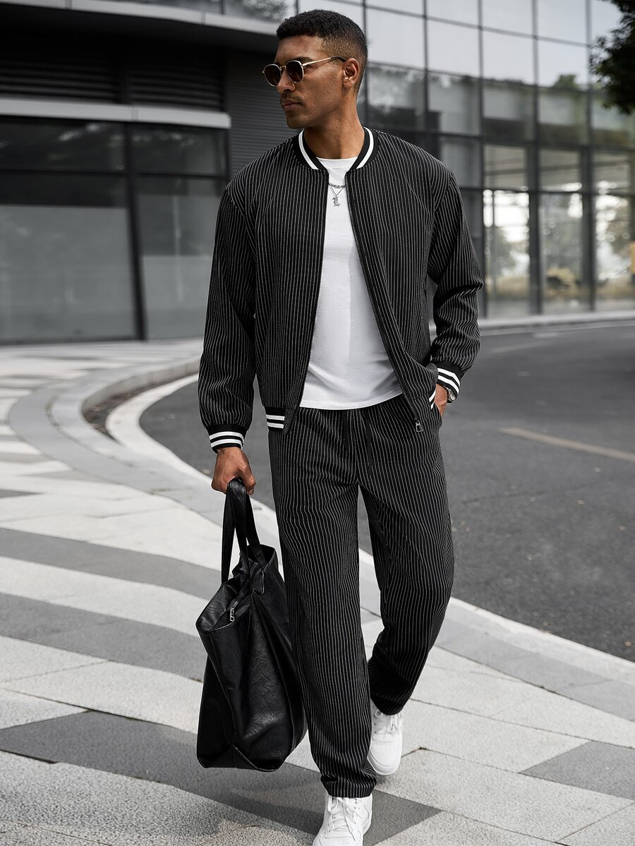 Manfinity CasualCool طقم كاجوال يومي للرجال مكون من جاكيت بأكمام طويلة وياقة بيسبول بتصميم كتل لونية وبنطلون - الأسود - مشاهدة 1