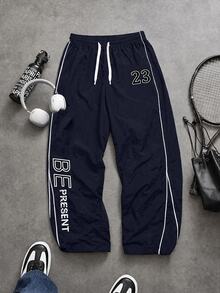 Sport MetroGents Men's Drawstring Waist Letter Pattern Casual Daily Travel Sports Long Pants - Navy Blue - View 1