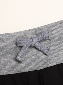 Barn- och tonårstjejens höst/vinter casual vardagsoutfit med stickad jacka med bokstavstryck i enfärgad svart, färgblockerad midja och utsvängda benbyxor, Back to School - Svart - Visa 9