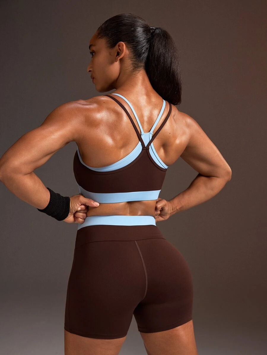 Powerista مجموعة حمالة صدر رياضية وشورت نسائي بتصميم ألوان بني وأزرق محددة بحزامين مزدوجين - بني - مشاهدة 1