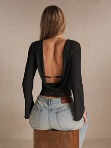 Poéselle Women's Ribbed Backless Top–Slim-Fit Boat-Neck Long-Sleeve Tee With Flared Cuffs, Lace-Trim Hem And Clasp-Strap Open Back Fall/Winter Going Out - Black - View 4